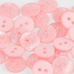 Bouton gravé d'arabesque