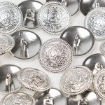 bouton métal armoirerie